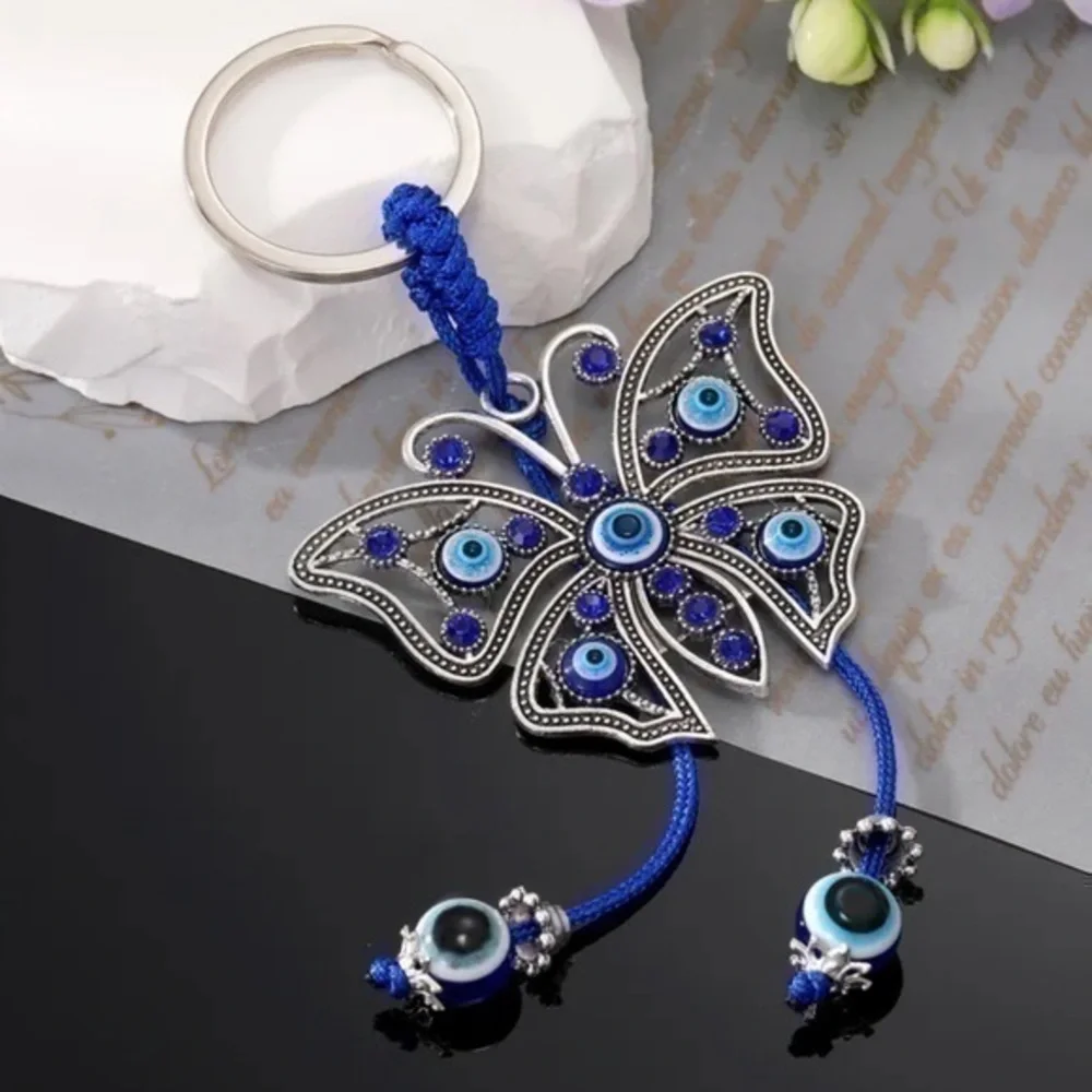 NEW Butterfly Blue & Silver Rope Good Luck Charm Bead Tassel Evil Eye Keychain